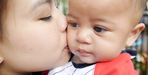 Mother Kiss Her Little Baby