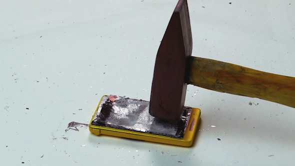 Destruction of a Cell Phone with a Hammer