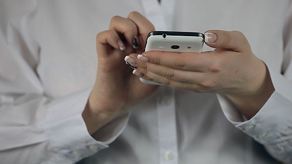 Close-Up Shot Of Female Hands Typing Sms