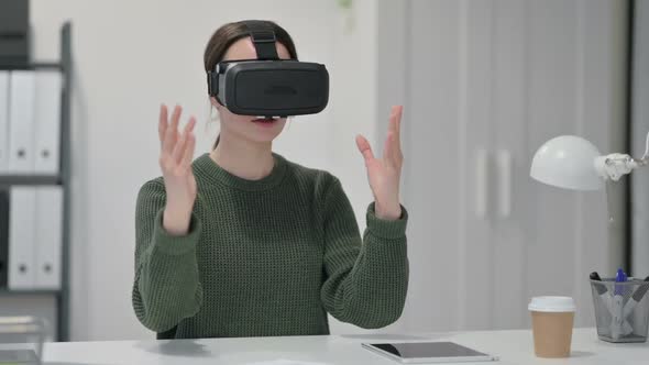 Young Woman Using VR Headset