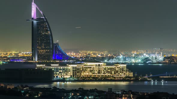 Dubai Skyline with Villas Nad Burj Al Arab Night Timelapse