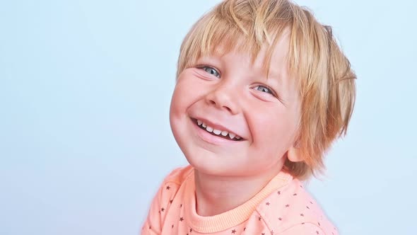 Portrait of a Cute Smiling Boy