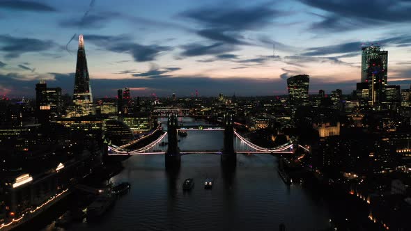 Aerial View of London over the River Thames including Tower Bridge, Shard and the Tower of London at
