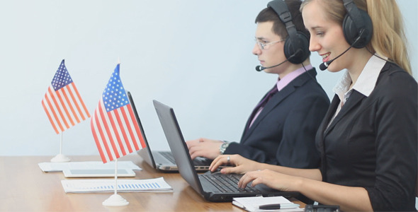 American Call Center Operators Working with Laptop alt