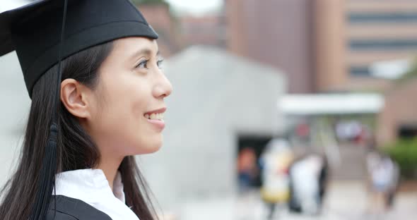 Happy woman get graduation in university