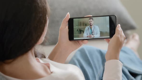 Over Shoulder Mobile Screen View Female Patient Woman Talks Remotely with Medic Provides Online