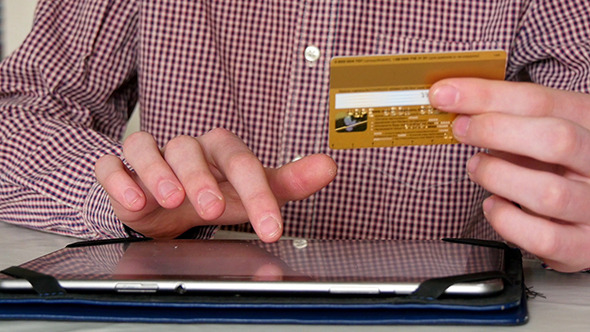 Shopping Online With Credit Card On Digital Tablet