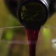 Pouring red wine from a bottle - VideoHive Item for Sale