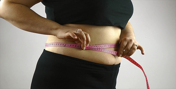 Woman Measuring Waist 