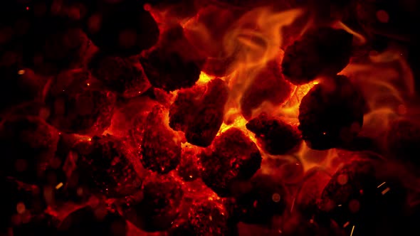 Super Slow Motion Shot of Glowing Coal and Sparks at 1000Fps