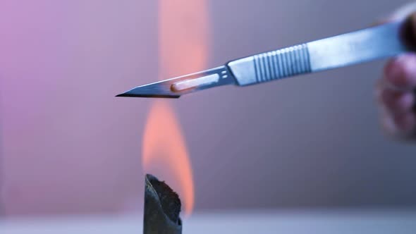 Scalpel And Forceps Sterilization With Fire