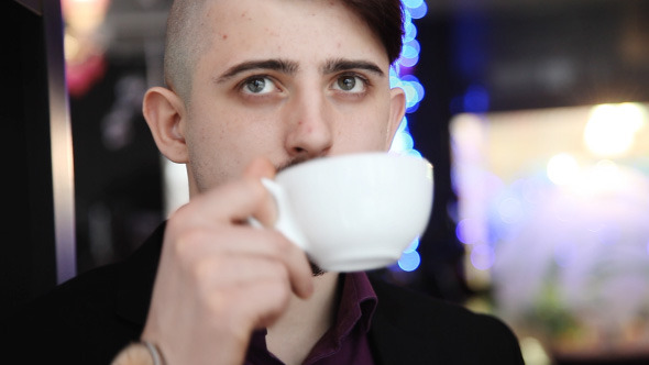 Man With A Cup Of Coffee