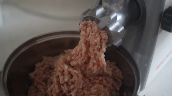 Minced Meat is Ground in a Meat Grinder