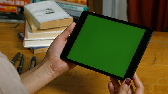 Girl Holding Tablet