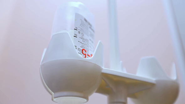 Infusion IV Drip Drops From Bottle with Solution