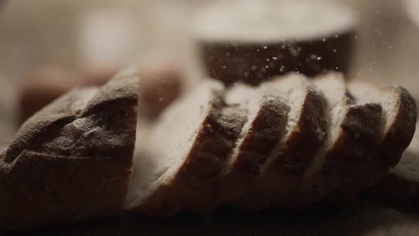 Close Up of Freshly Baked Bread is Sprinkling with Flour