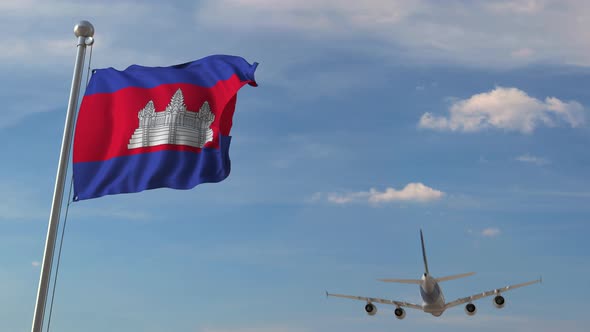 Airliner Passing Above National Flag of Cambodia