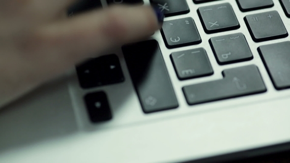 Woman Hand Typing On Laptop Keyboard