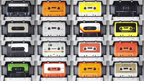 Cassettes Changing In A Retro Tape Player Multi Screen alt