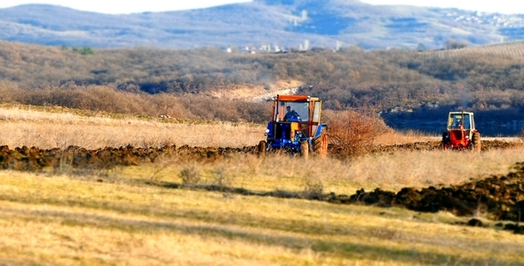 Tractors During Plowing ( Miniature Effect)