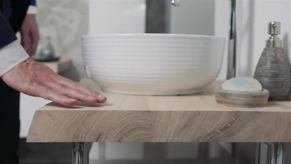 Hands Choosing in Bathroom Salon