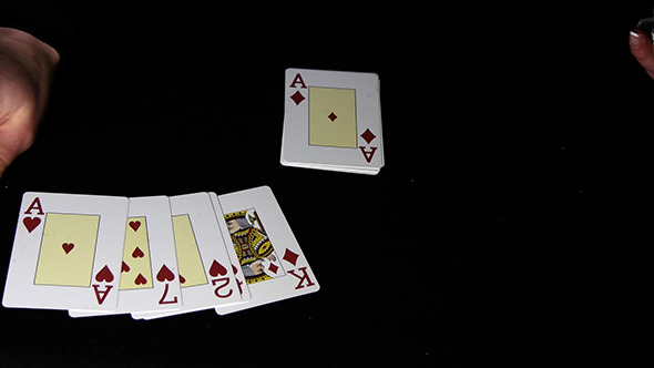 Dealing Poker Cards On Black Background