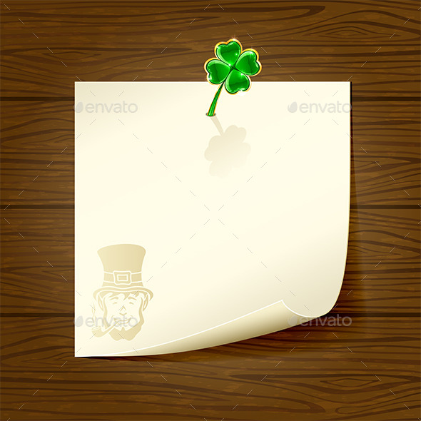 Wooden Background with Paper and Clover