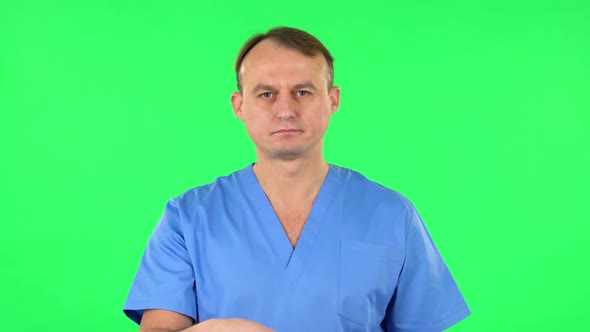 Medical Man Waving Hand and Showing Gesture Come Here, Green Screen