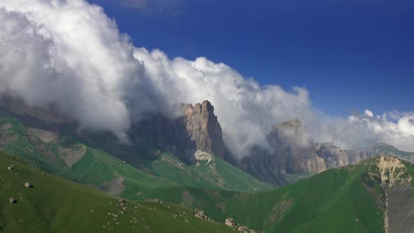 Caucasus Mountains Under Moving Clouds