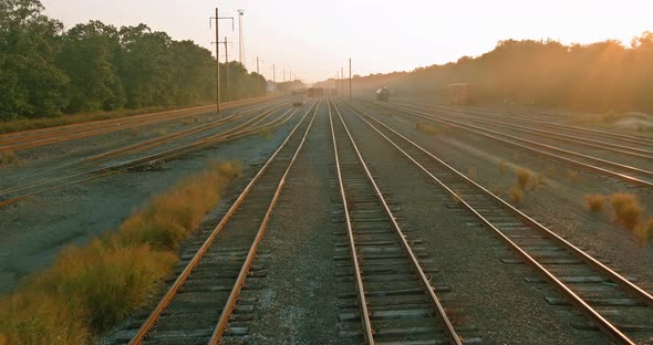 Cargo Train Railroad Platform with Industrial Landscape with Sunset Railroad Station