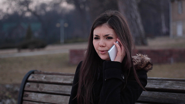 Woman speaking on cellular phone