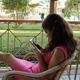  Woman Using Smartphone On Balcony - VideoHive Item for Sale