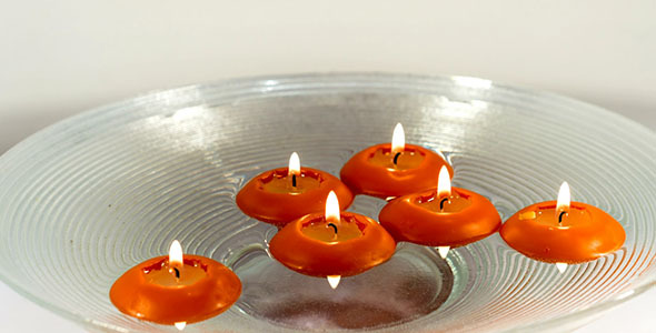 Floating Candles on Water Burning