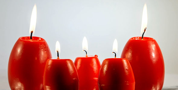 Red Easter Egg Shape Candles Burning