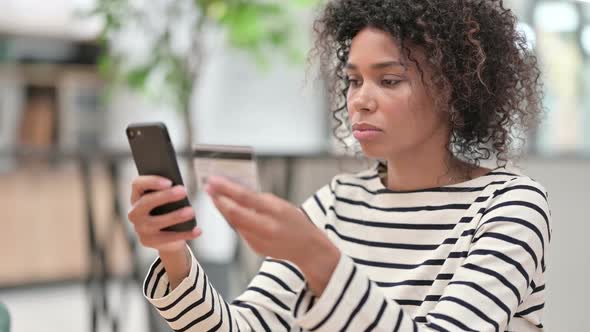 Online Shopping By African Woman Via Smartphone