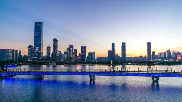 Timelapse of city skyline from day to night in shenzhen china