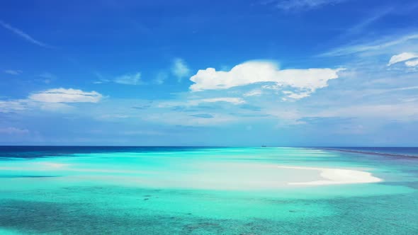 Aerial scenery of perfect island beach adventure by aqua blue water with white sand background of a 