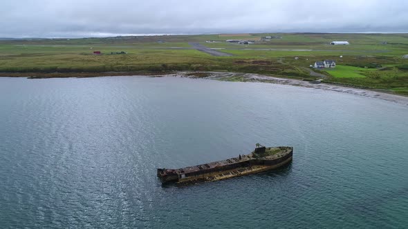 Slow motion, Wreck of Juniata, an old abandoned ship at Inganess Bay on the mainland of Orkney, Scot