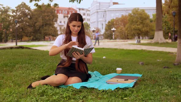 Girl Read Poem in Park