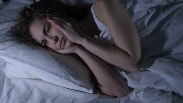 Headache, Uncomfortable Female in Bed