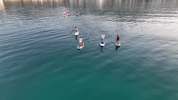 Sup surfing group aerial view 4 K Turkey Alanya