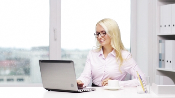 Smiling Woman Or Secretary With Laptop And Coffee