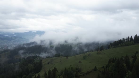 çUkraine, Carpathians: Fog in the Mountains. Aerial.