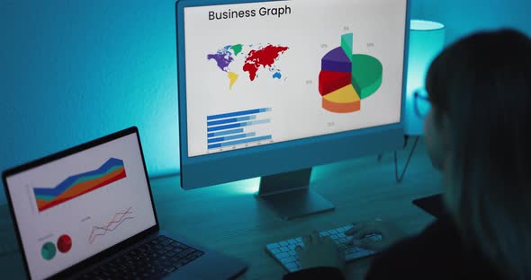 Young woman analyzing data charts for marketing financial reports