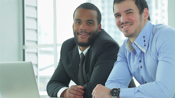 Two Businessmen In Office