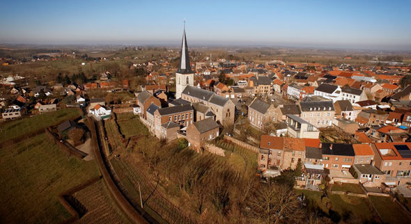 Aerial Footage Of A Small Village on A Hill 