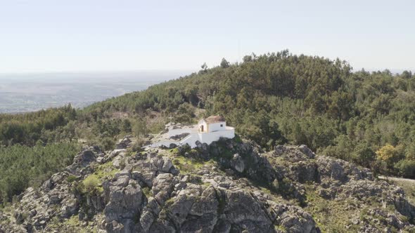 Aerial drone view of Ermida da Nossa Senhora da Penha in Serra de Sao Mamede mountain