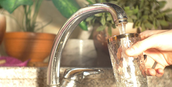 Pouring A Glass Of Water alt