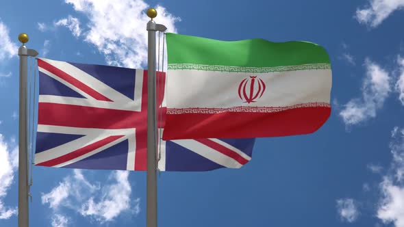 United Kingdom Flag Vs Iran Flag On Flagpole