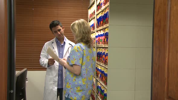 Doctor And Nurse In Filing Room (7 Of 7)